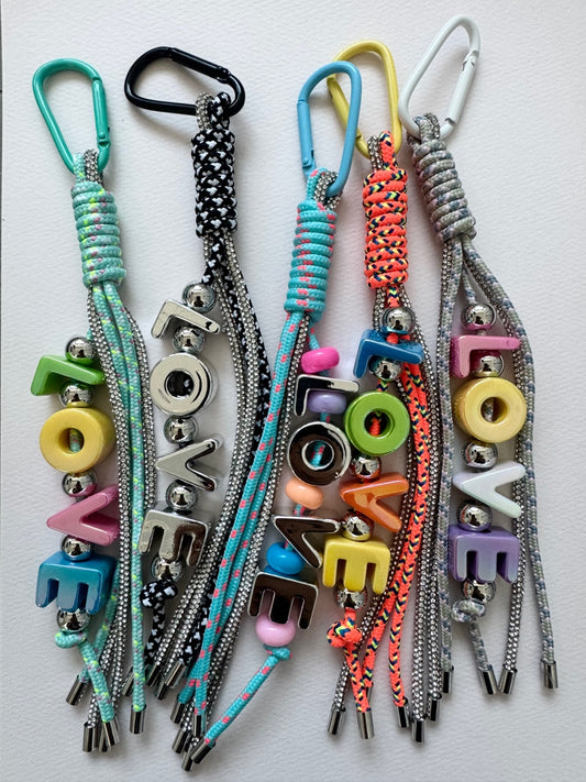 CRISTAL AND ROPE CHARM