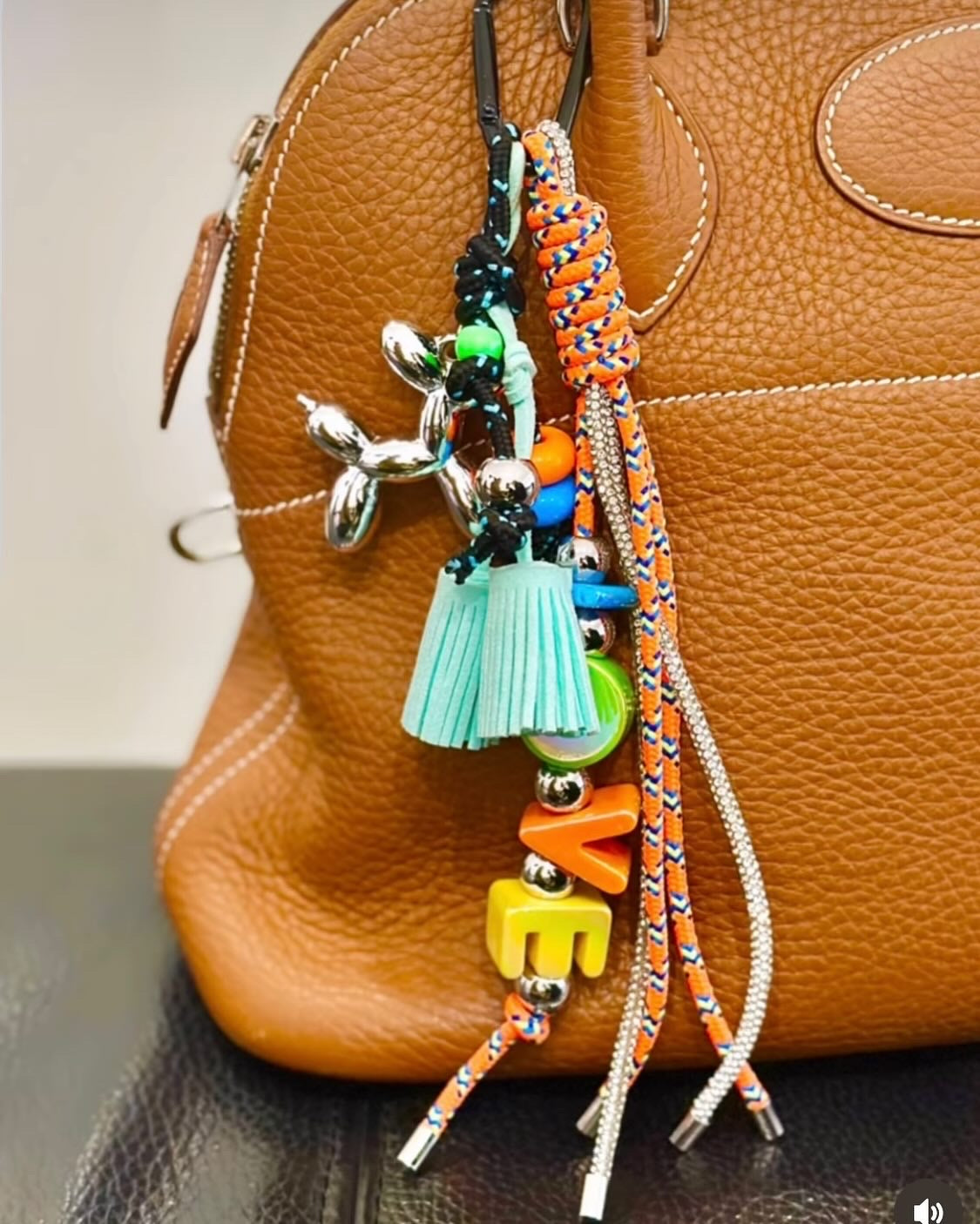CRISTAL AND ROPE CHARM